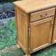 Solid oak sideboard. Three drawers.