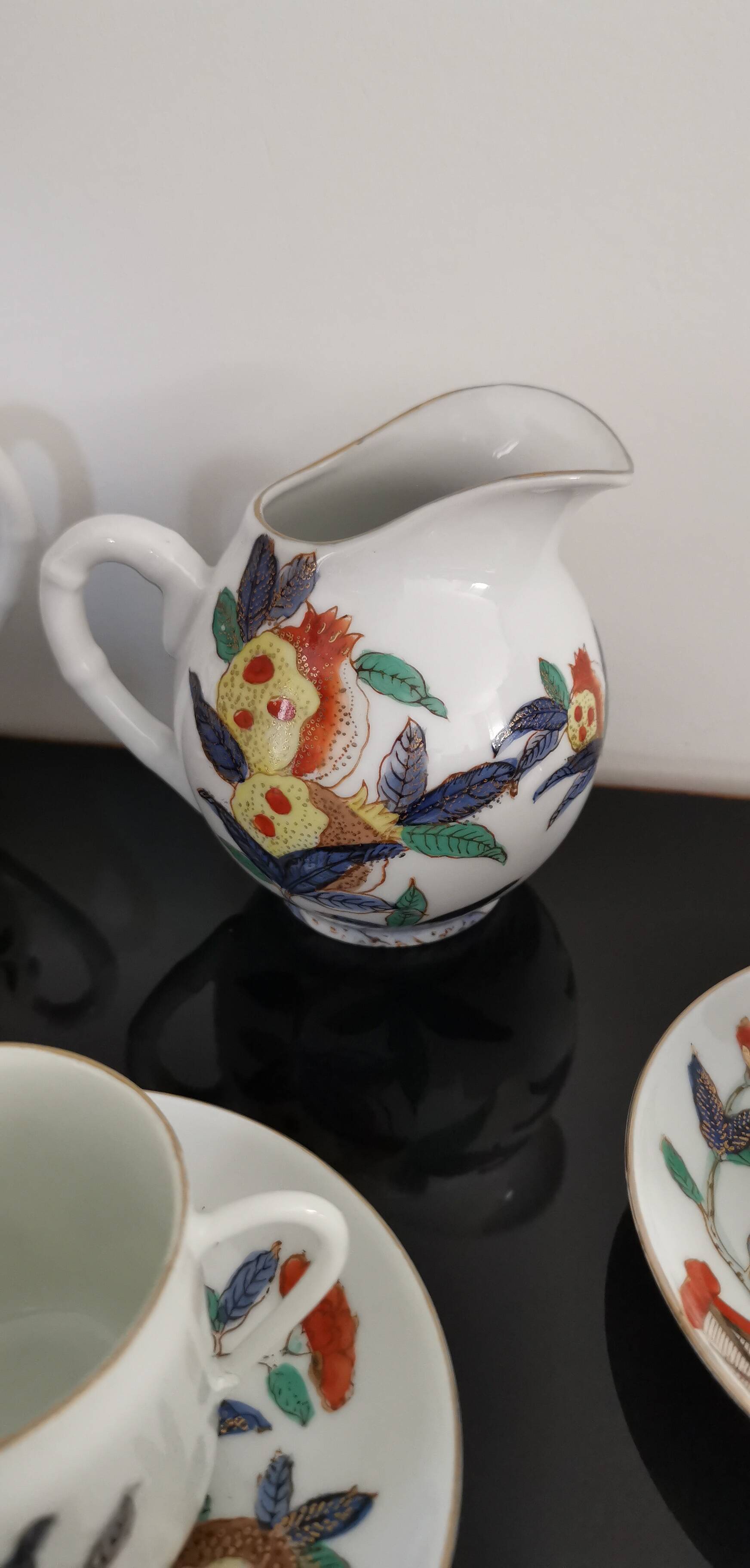 Set of 6 porcelain cups, 6 saucers, teapot and milk jug