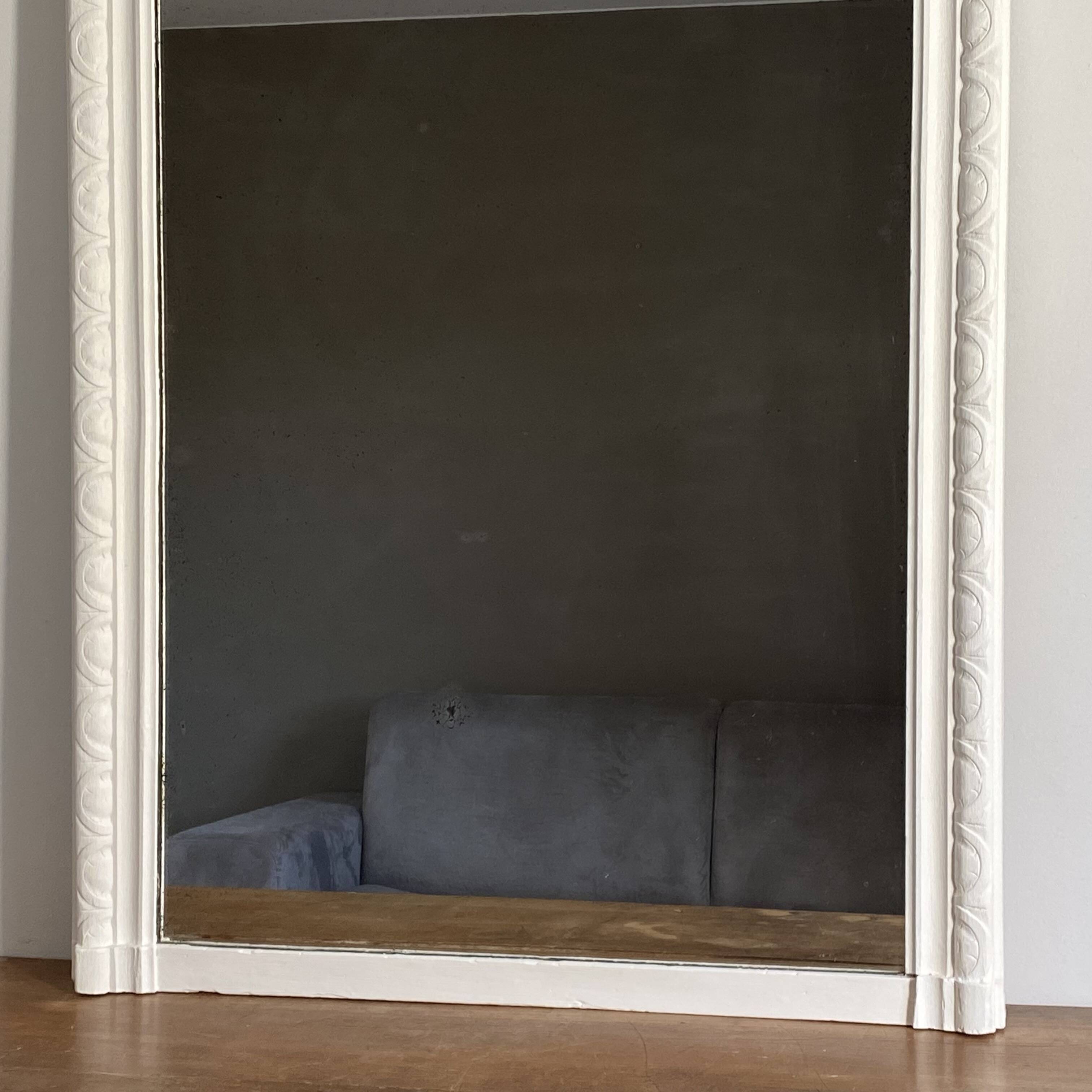 Grand miroir Louis Philippe blanc. 145x90. Fin 19ème.