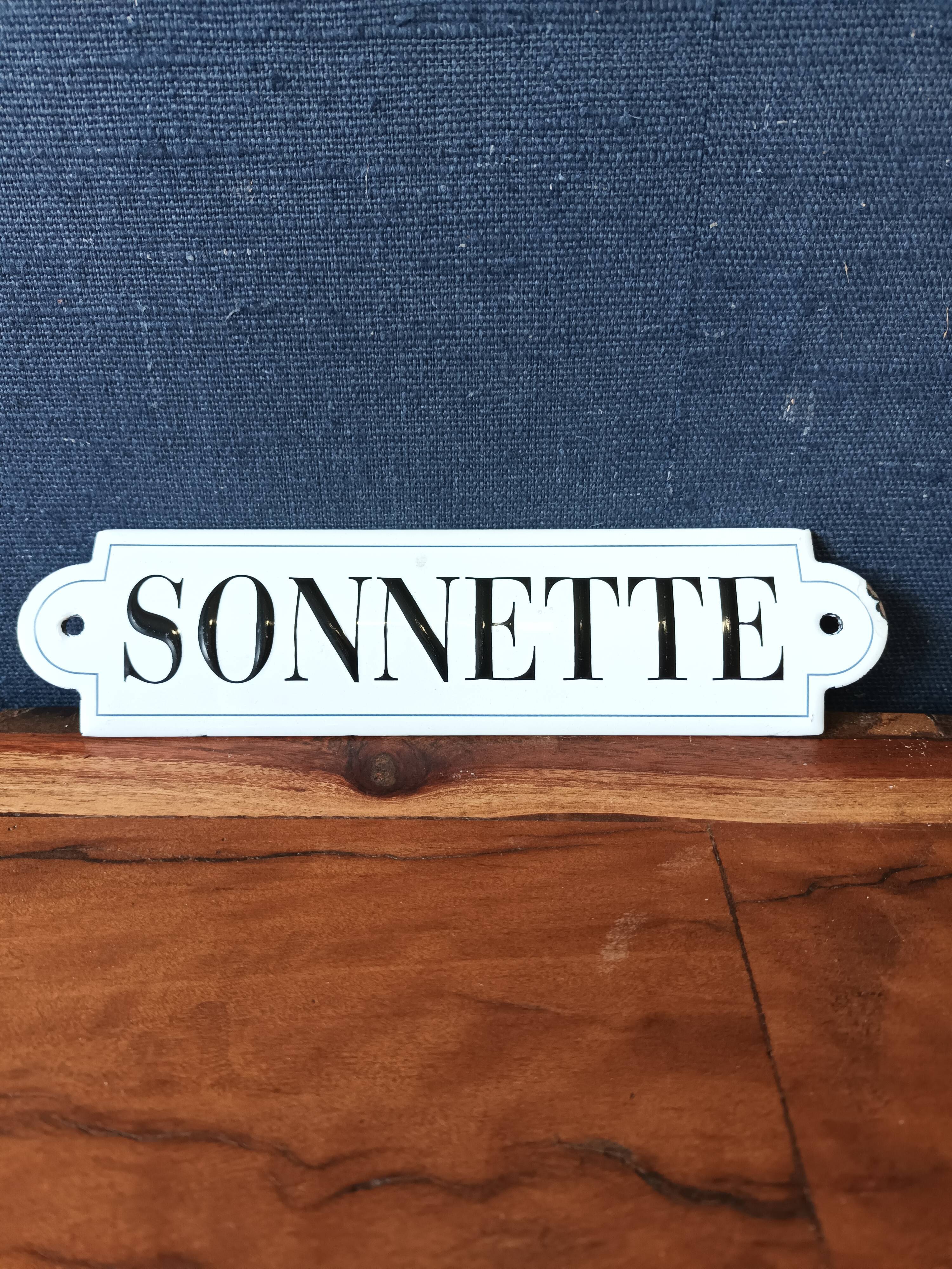 Doorbell enamel plate
