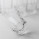 Vintage set of 9 Murano glasses from the 1980s, octagonal shape in art glass, classic Italian tableware.