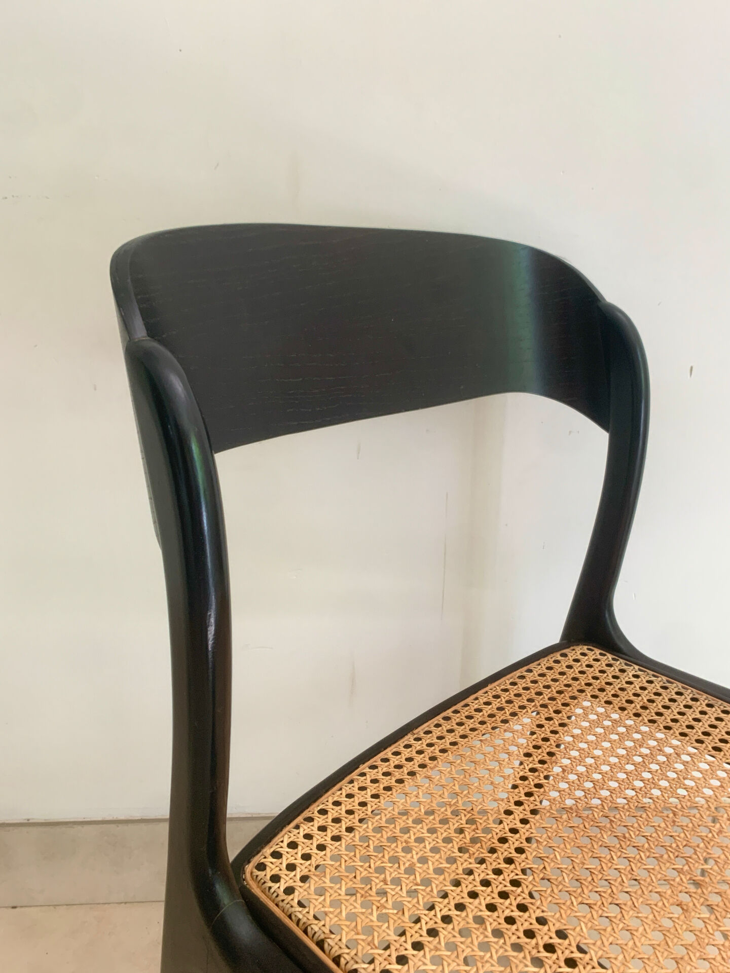 Set of 4 Baumann sled chairs with caning.