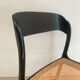 Set of 4 Baumann sled chairs with caning.