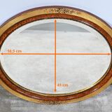 Miroir ovale en bois doré – début XXe