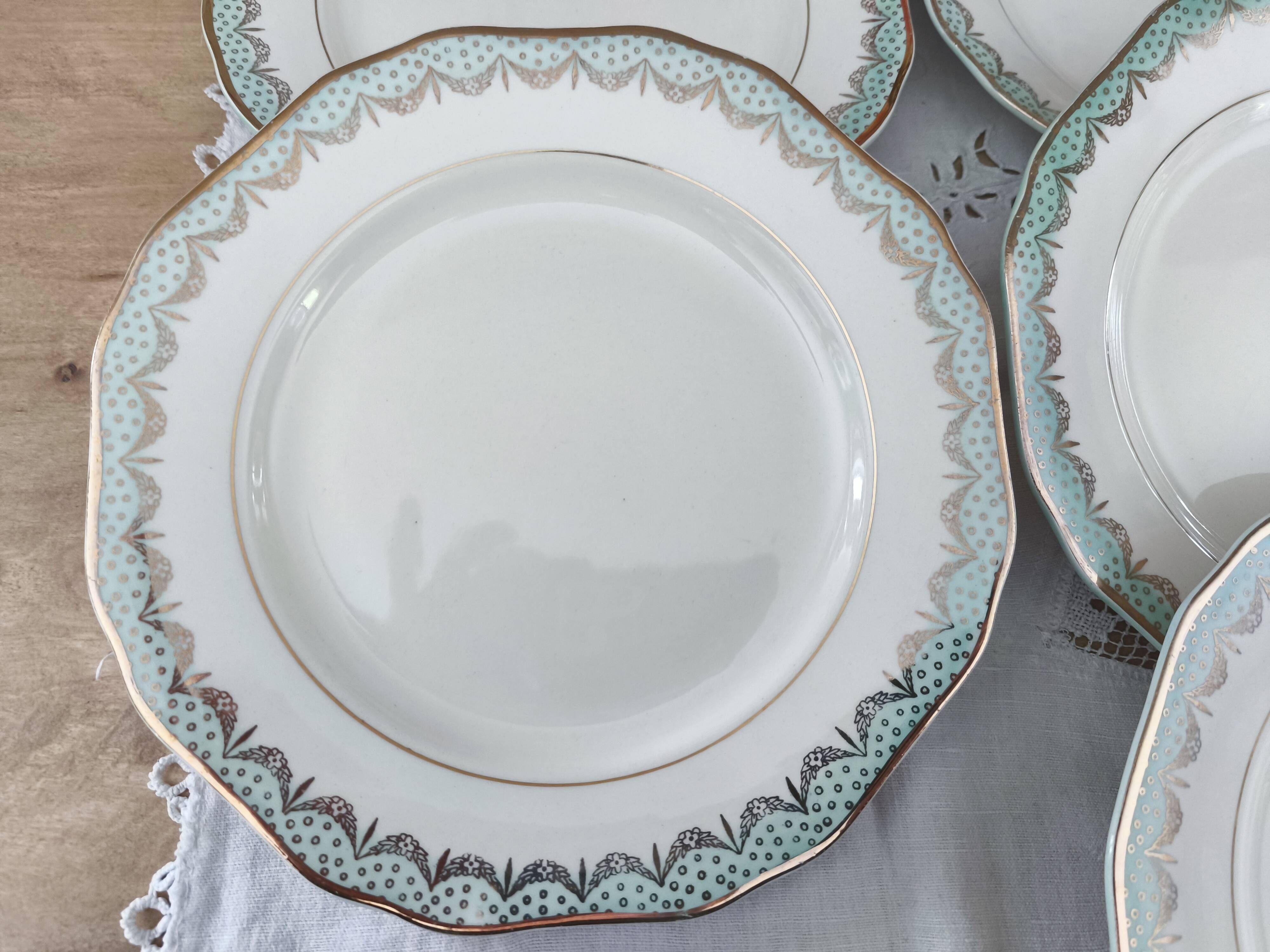 Set of 7 Longwy France earthenware dessert plates, Trianon model