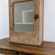 Small glass wall cabinet from the 1960s.