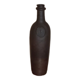 Old terracotta bottle with small spout
