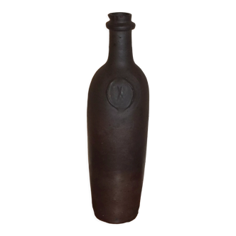 Ancienne bouteille en terre cuite avec petit bec verseur