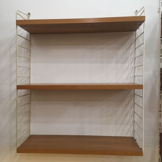 The Ladder Shelf wall unit, designed by  Kajsa & Nils Strinning for String, 1960s