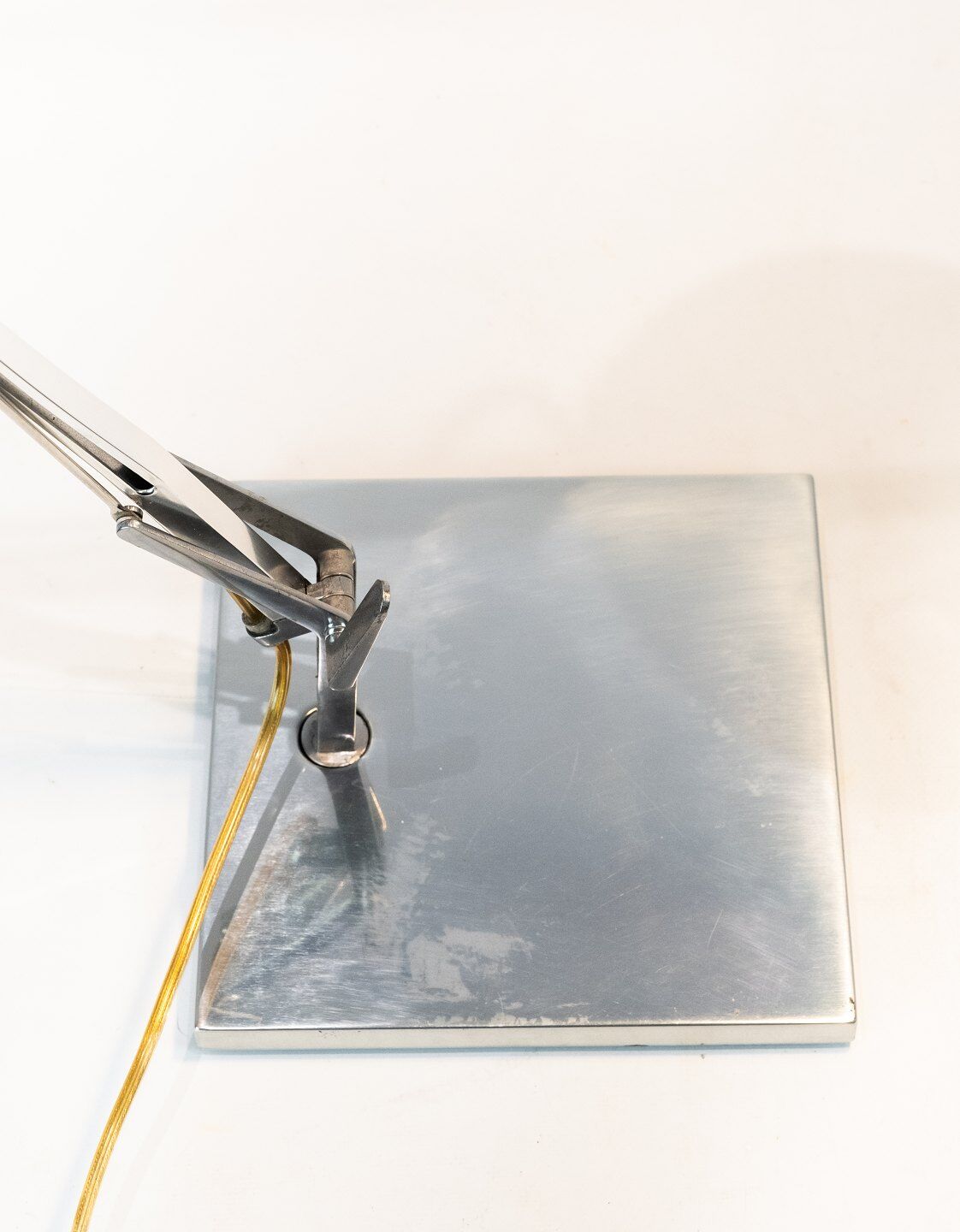 Table lamp of stainless steel and of italian design by Flos