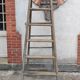 Old wooden stepladder stamped