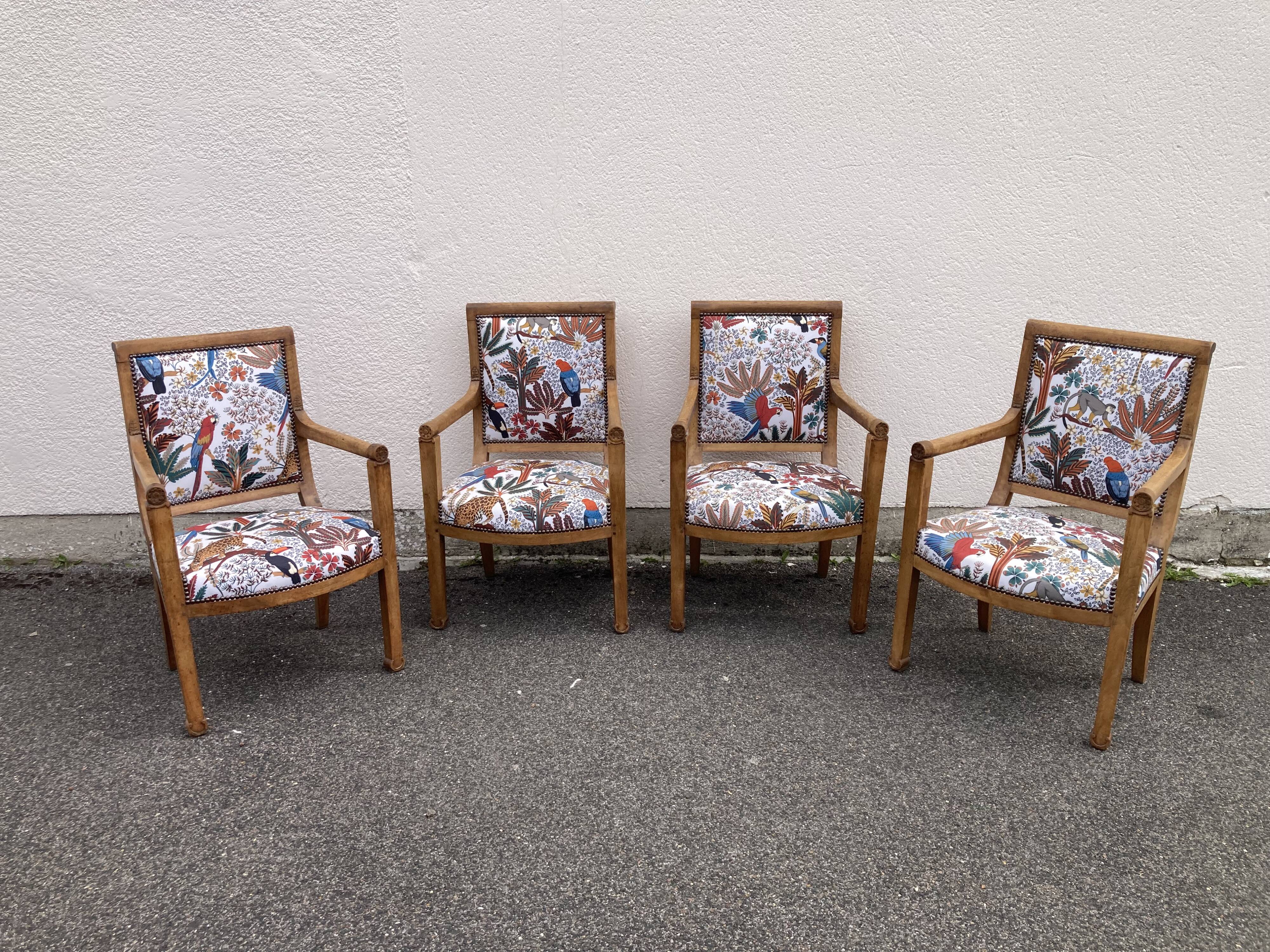 Set of four reupholstered Directoire period armchairs.