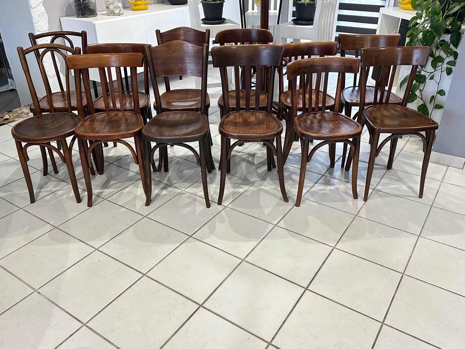 Set of 12 mismatched bistro chairs Baumann & Fischel 1930