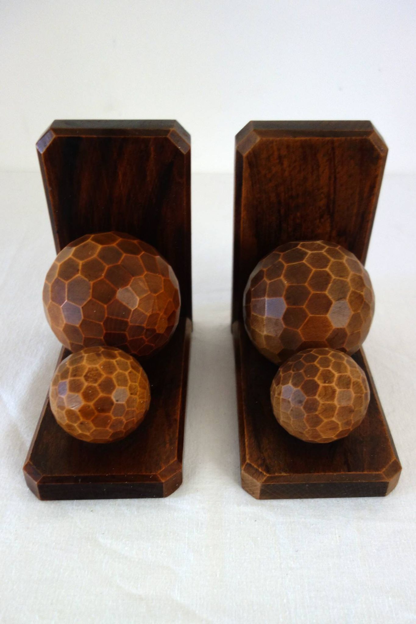 Pair of vintage wooden bookends with faceted balls