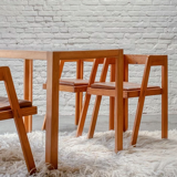 Ensemble de 4 chaises et table avec plateau en formica