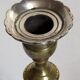 Duo of solid brass and gold metal candle holders worked old