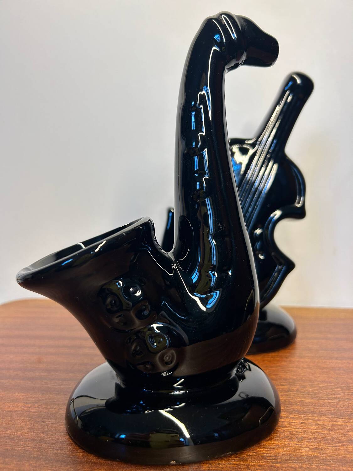 Black ceramic guitar and trumpet vases from the 60s