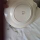 Set of 5 flat plates, signed Longwy.