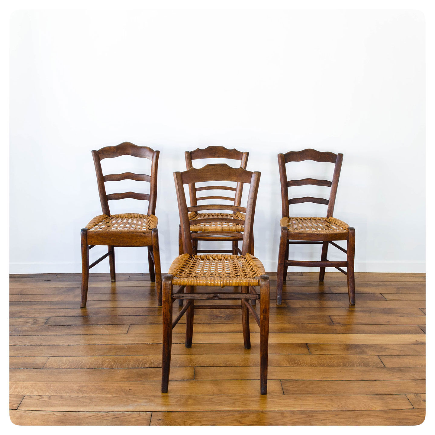 4 old flying chairs with natural canning seat