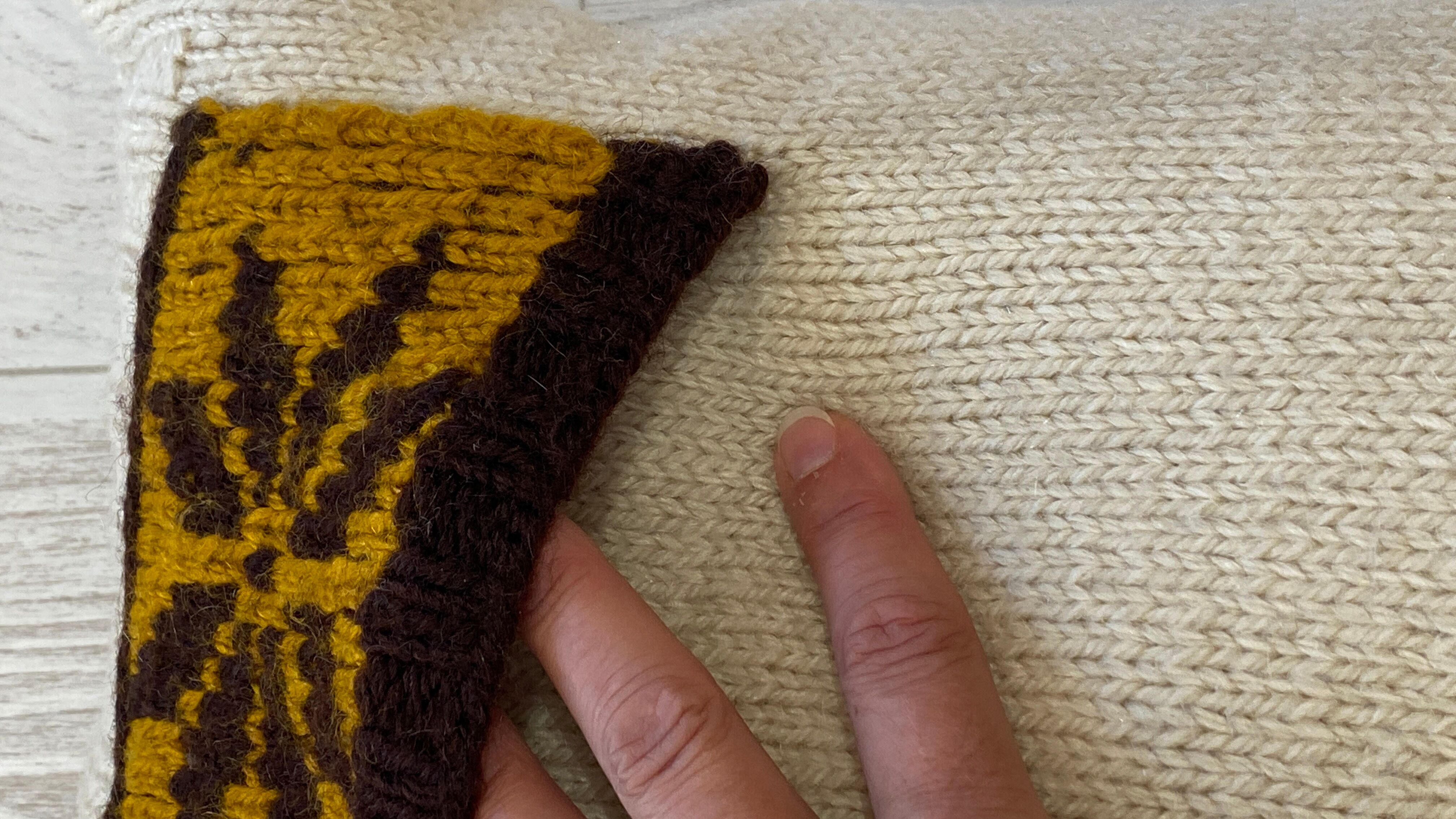 Pair of vintage retro wool knitted cushions
