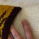 Pair of vintage retro wool knitted cushions