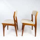 Set of dining room chairs in teak and upholstered with light fabric, designed by erik buch, 1960s