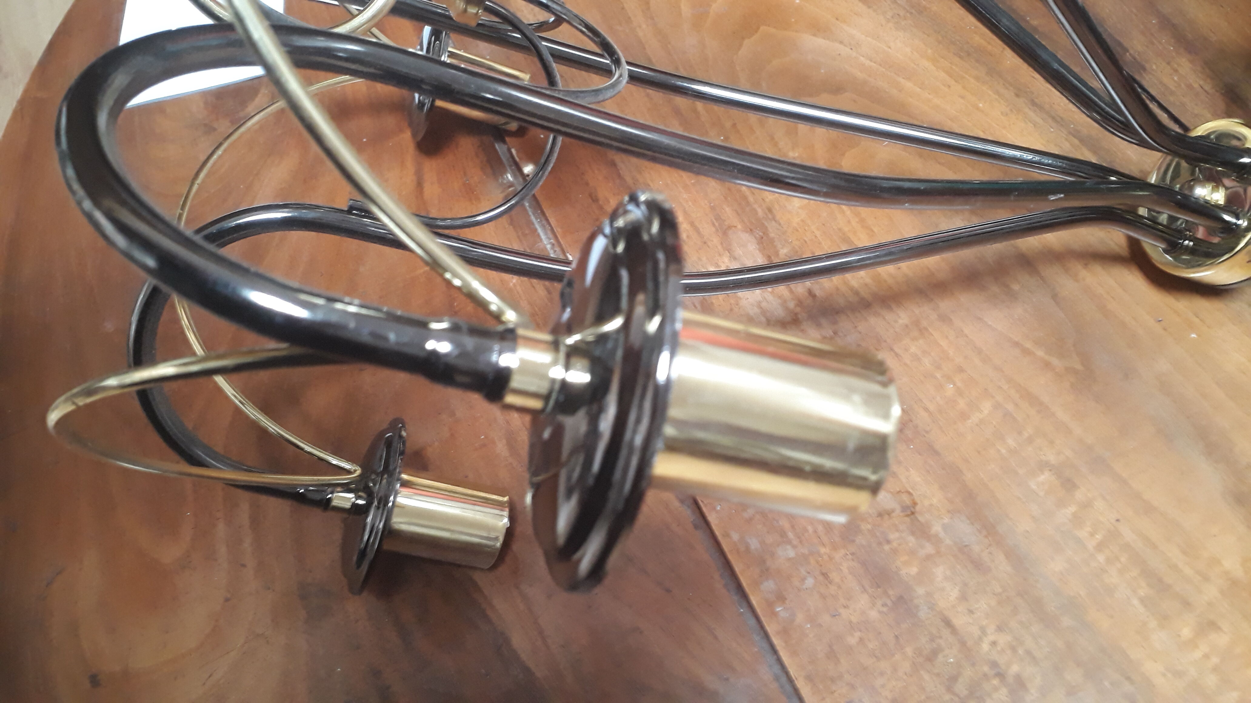 Black chrome chandelier and vintage gold veneer