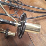 Black chrome chandelier and vintage gold veneer