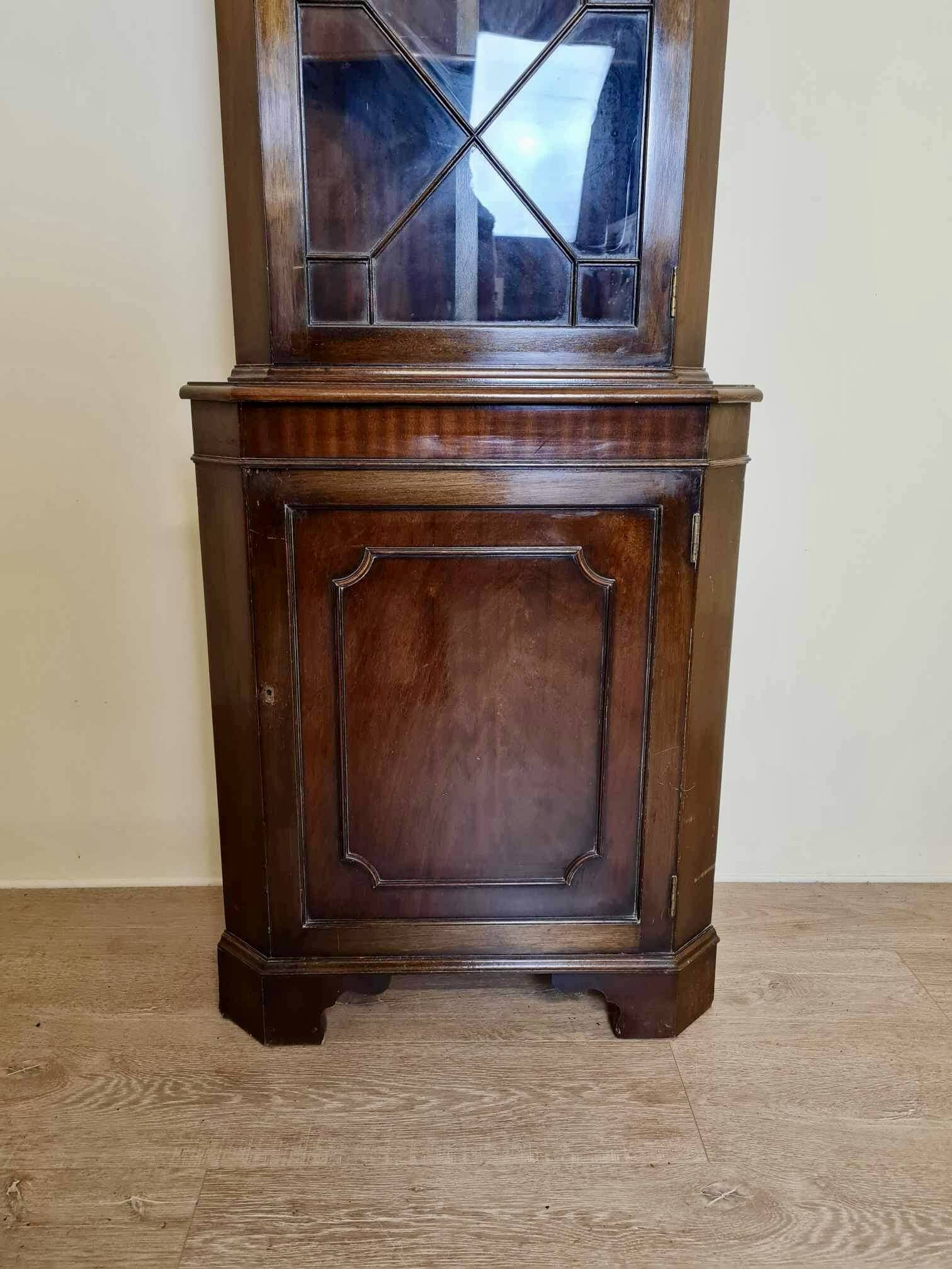 Pretty English mahogany corner bookcase