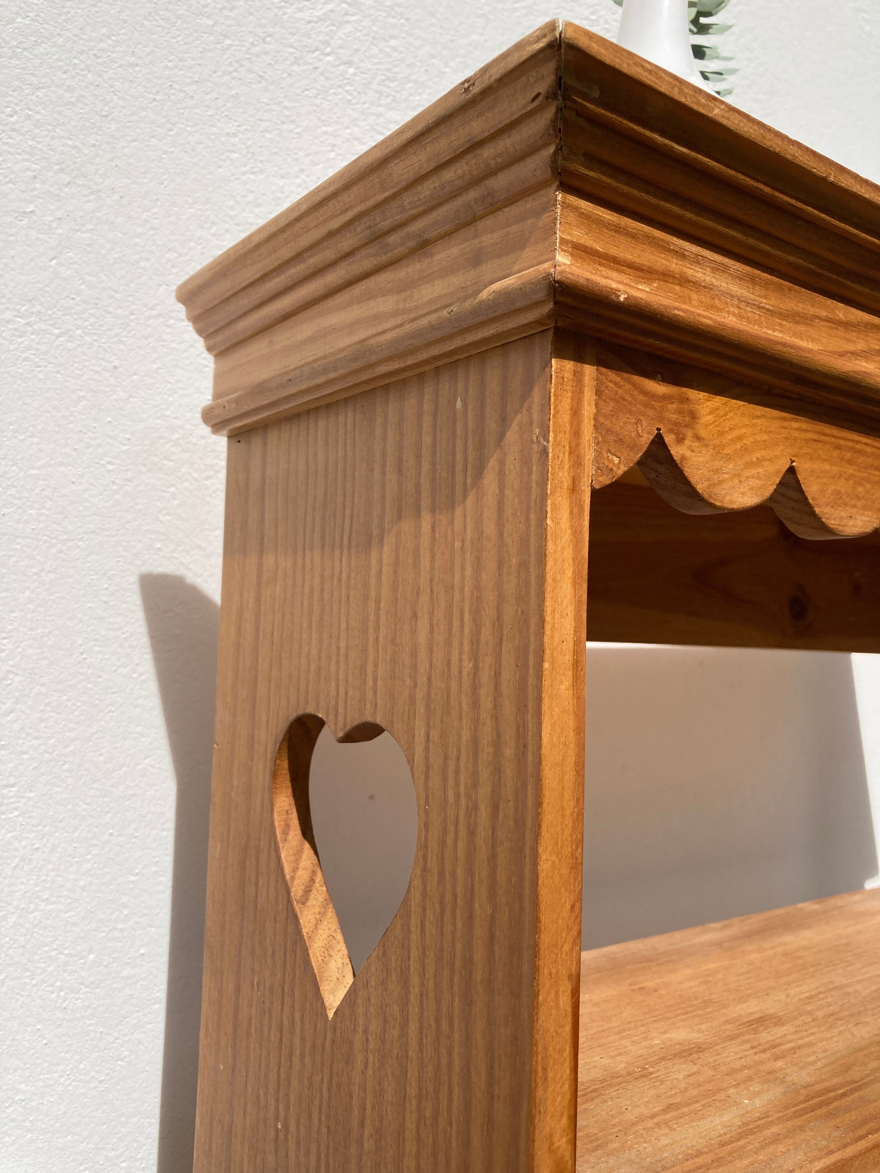 Wall shelf in raw wood with drawers and openwork hearts