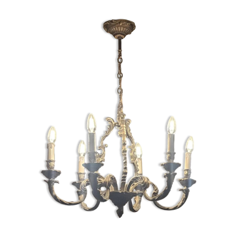 Decorative chandelier with 6 arms in patinated metal.