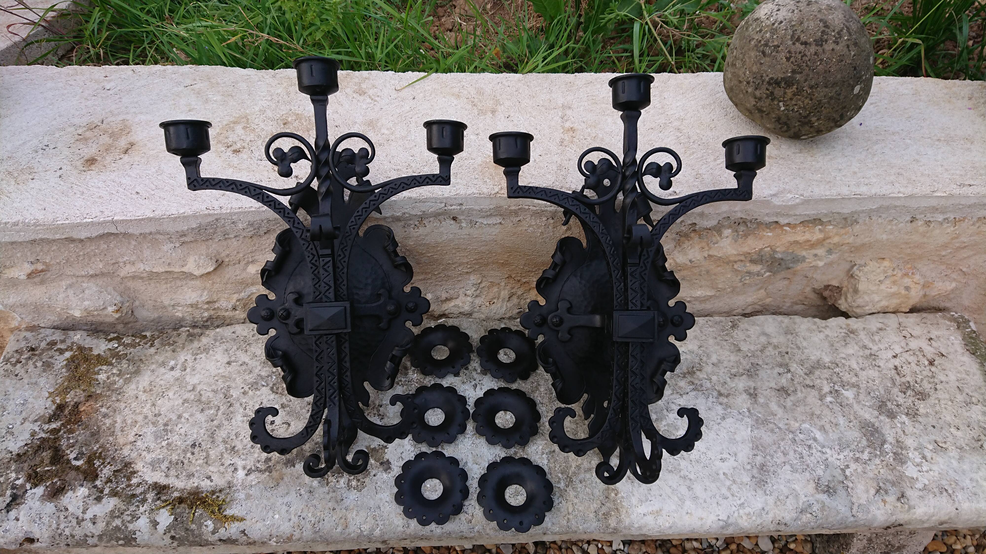 Pair of black wrought iron sconces - neo-Gothic style - from the 1950s