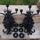 Pair of black wrought iron wall sconces - neo-Gothic style - from the 1950s