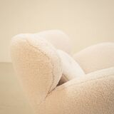 "Bear" rotating armchair in 80's curly wool