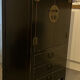 Asian-inspired black lacquered wooden wardrobe