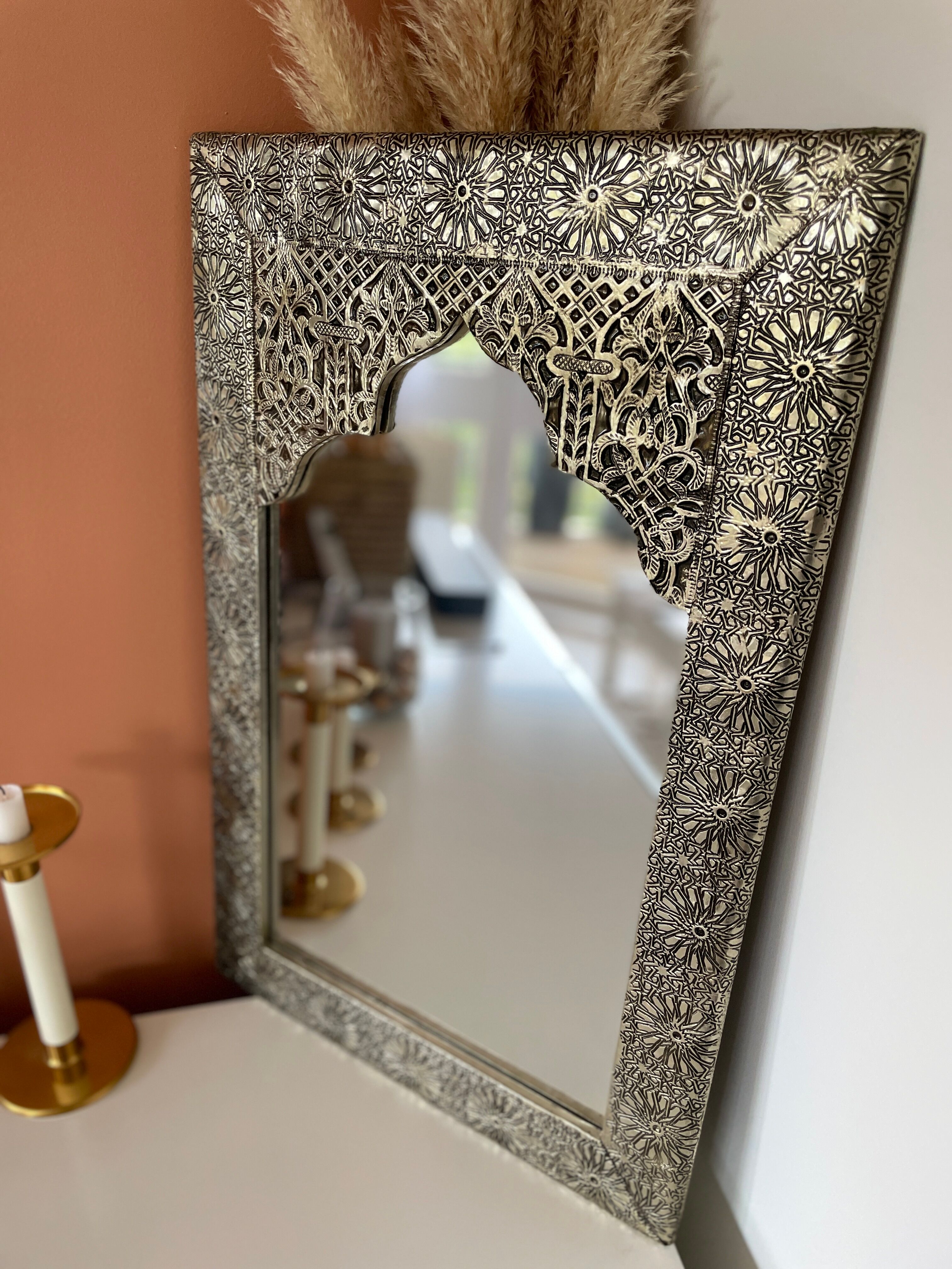 Silver oriental mirror