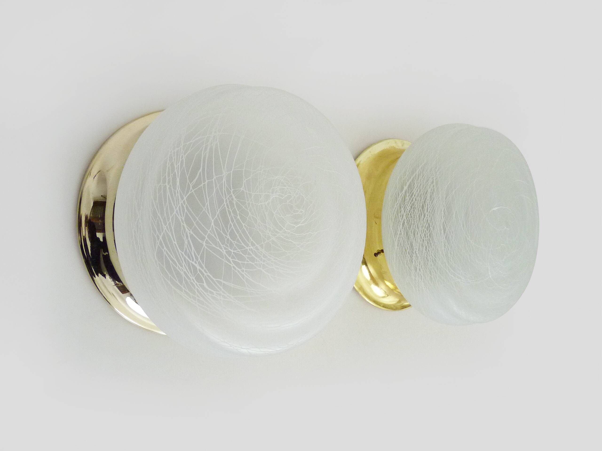 Pair of wall or ceiling lights with white-edged globe. 80 years