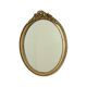 Miroir ovale vintage en résine dorée à la feuille d'or, style années 60. Classique.