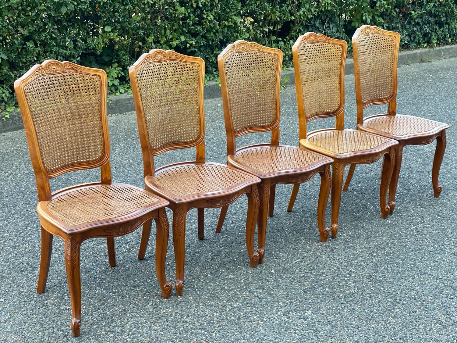 5 solid wood caned chairs, Louis XV style, stamped Baumann