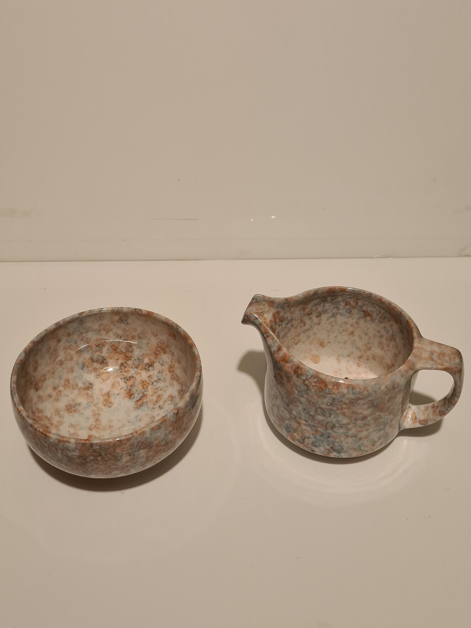 Porcelain milk jug and sugar bowl from Virebent Puy l'Evêque