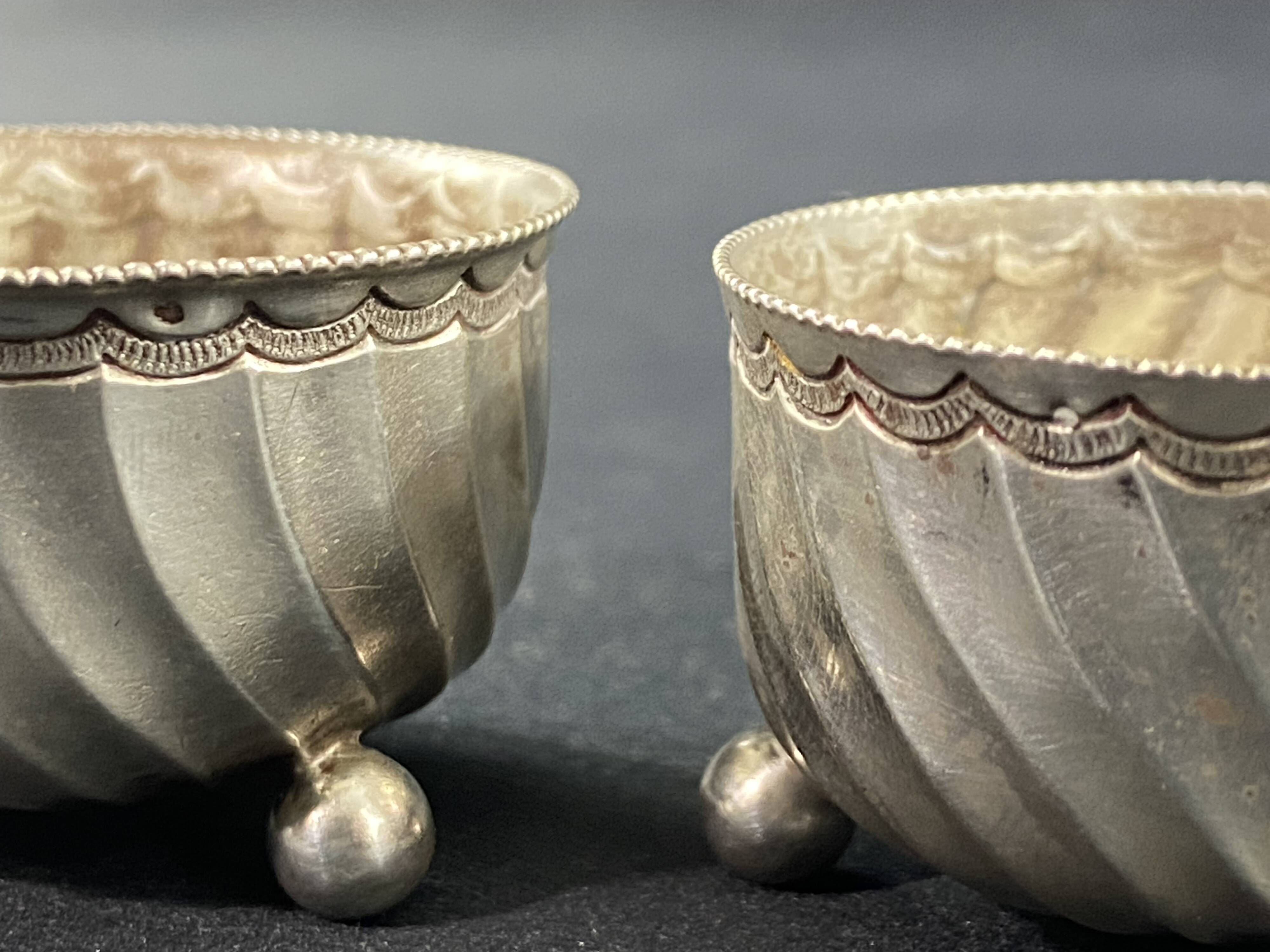 Pair of solid silver salt cellars with weevil hallmark