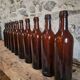 Set of 10 bottles of old Bordeaux French wine in ruby brown glass, 19th century.