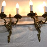 Paire d’appliques bronze 2 lumières style Louis XV
