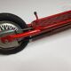 Former red pedal trotinette, 60-70s