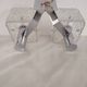 Vintage wall light in textured moulded glass and chrome metal.