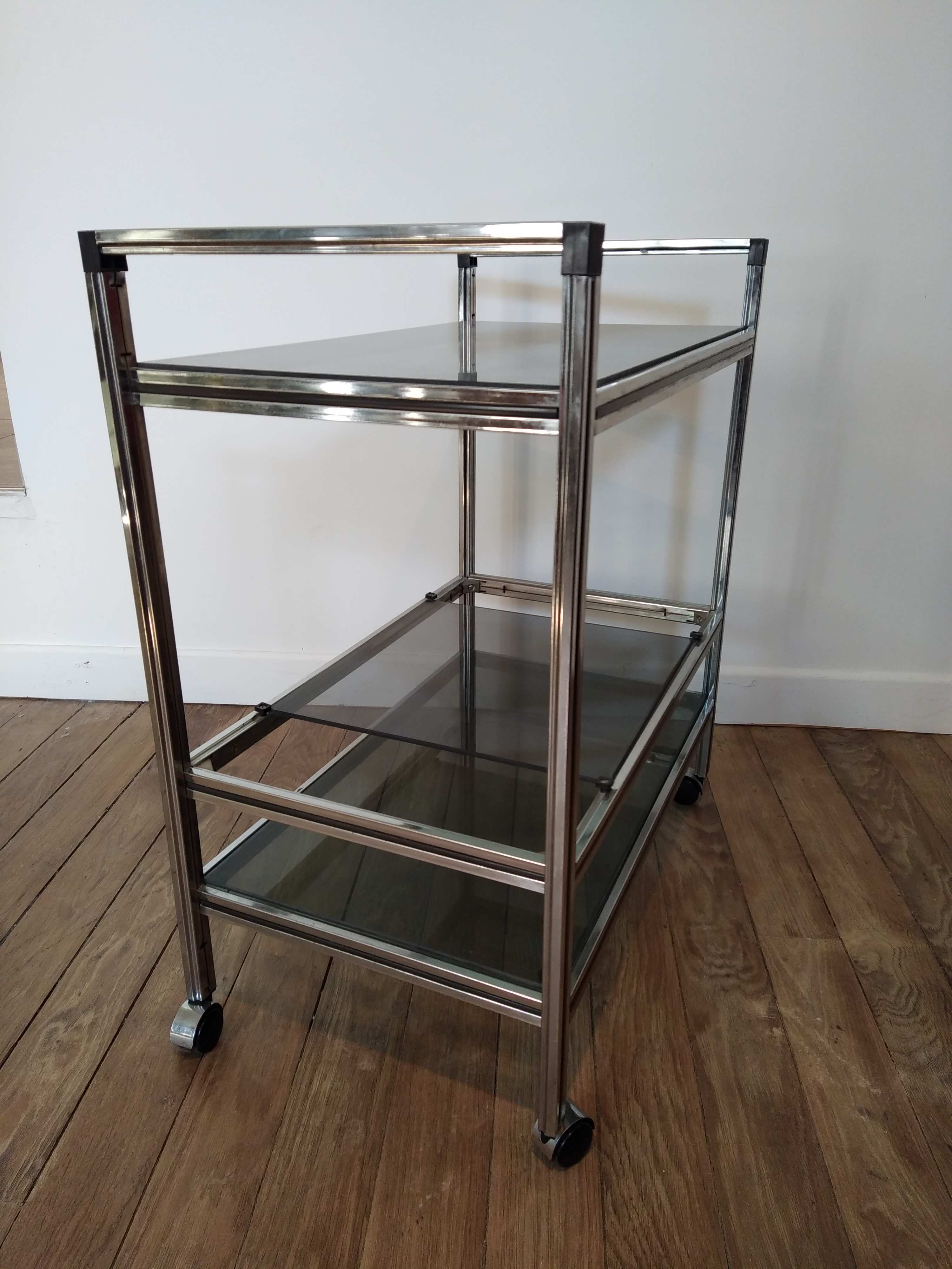 Stainless steel bar and smoked glass serving table