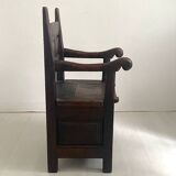 Fauteuil d’âtre formant coffre en chêne massif XVIIIème siècle