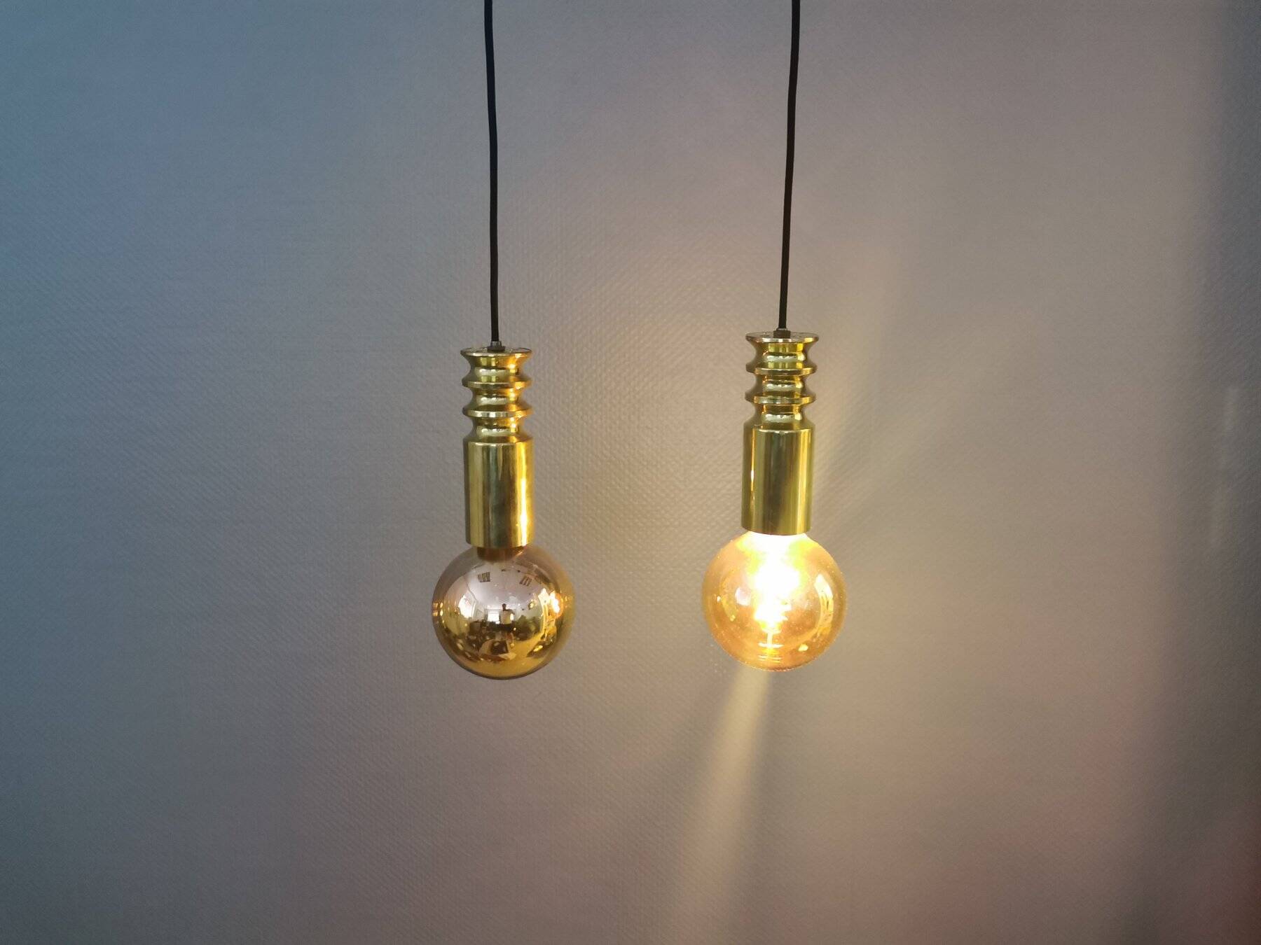 Frimann Goldstar pendant lights made by Philips in the 1970s. Model SPYBALL