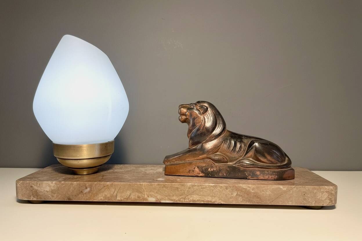 Art Deco lamp with marble, opaline globe & lion sculpture in spelter