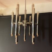 Scoliari chandelier with 18 bright nickel dots distributed by Boulanger
